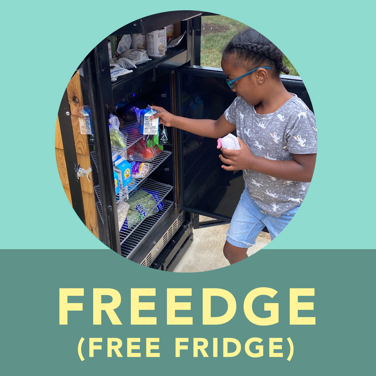 African American girl picking milk out of the freedge (free fridge)