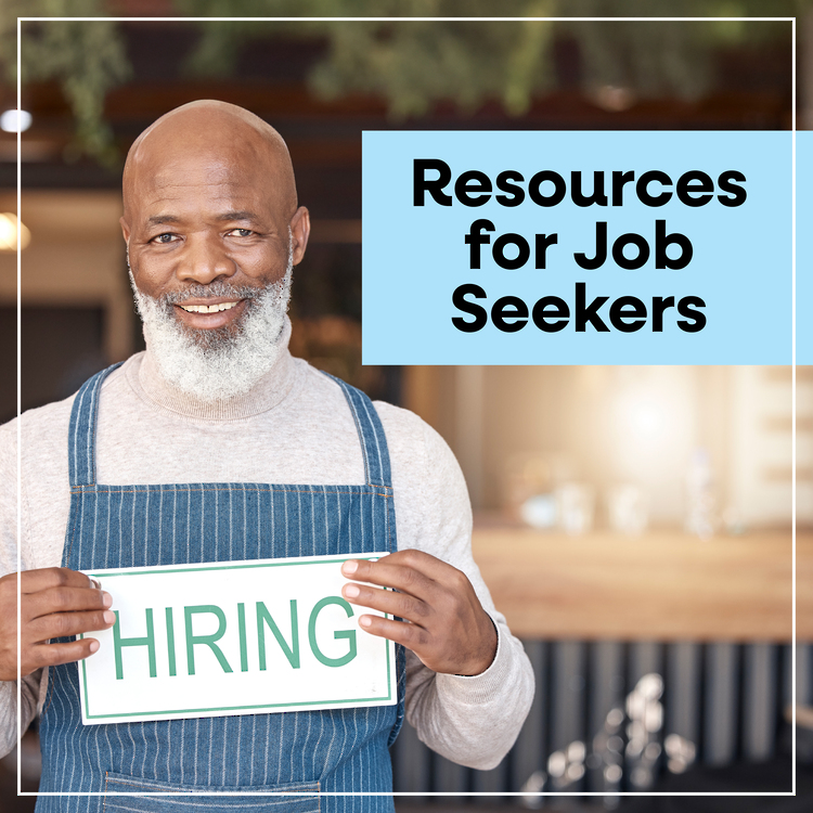 African American male with white beard holding a sign that says HIRING