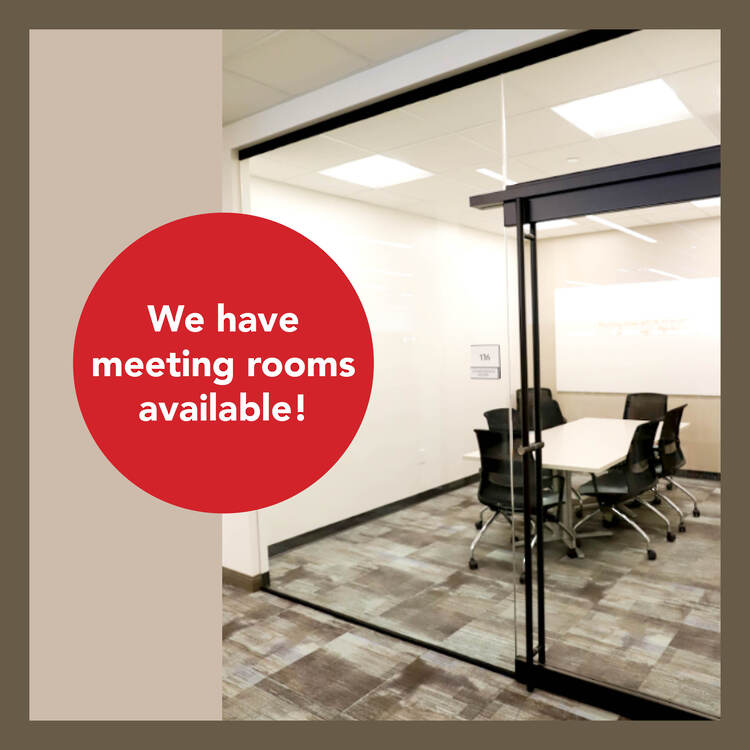View inside a meeting room with table and chairs