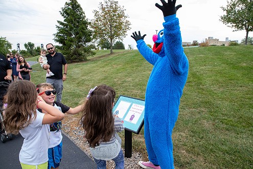 Cookie monster with Children at StoryWalk®