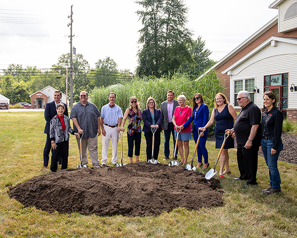 Lorain Public Library System Board of Trustees, LPLS Director, Avon Mayor Jensen and members of City Council, and representatives from architectural firm GPD Group and Gilbane Building Co. break ground on the new Avon Branch renovation and expansion on August 10.