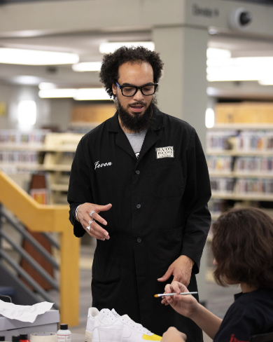 Jevon Terance instructing in the library