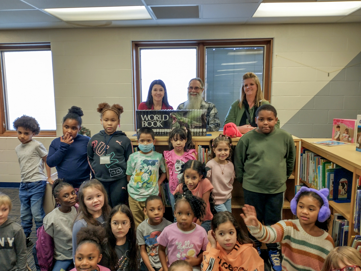 When the Friends of the Lorain Public Library heard that the Jacinto school library had flooded, destroying many of their books, they donated a set of encyclopedias to help replenish their collection.