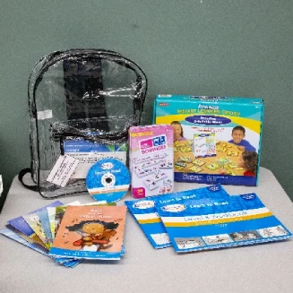 Photo of the contents in Early Literacy Backpack #4